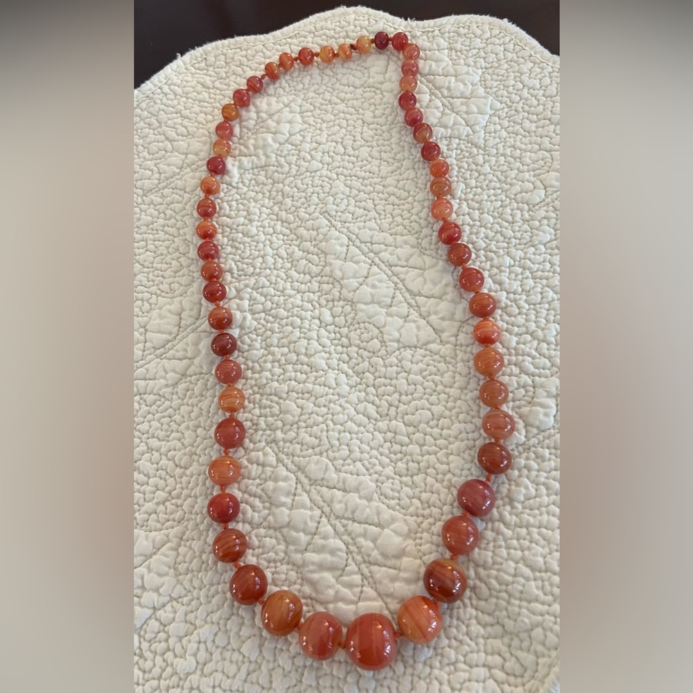 Polished agate hand tied beads necklace 26 inches lengyh.